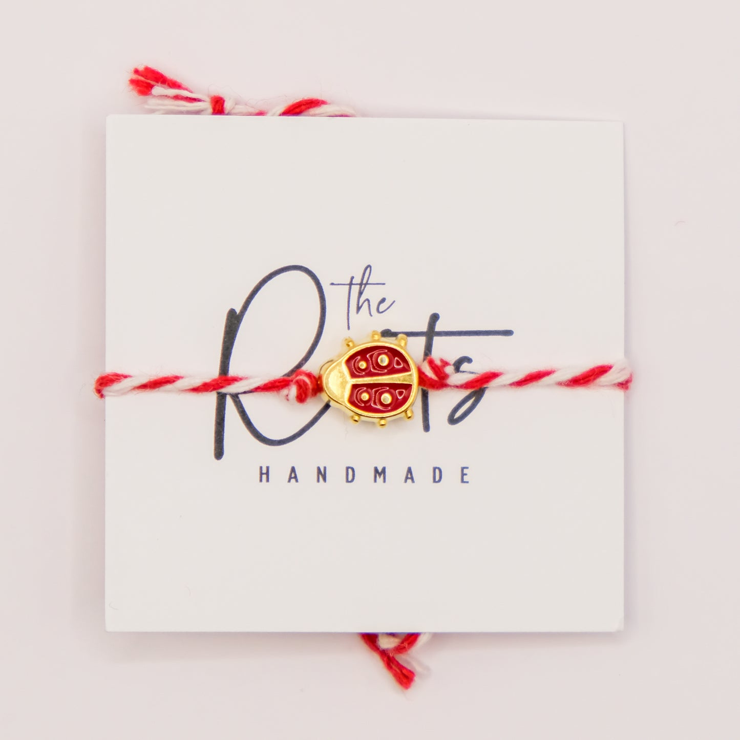 Red lady bug March bracelet